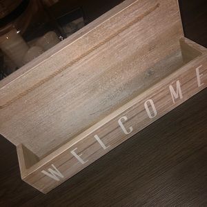 Wall decor with hooks and space to store mail etc